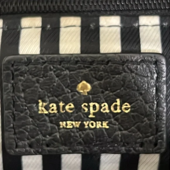 Kate spade everyday purse black leather with removable strap.